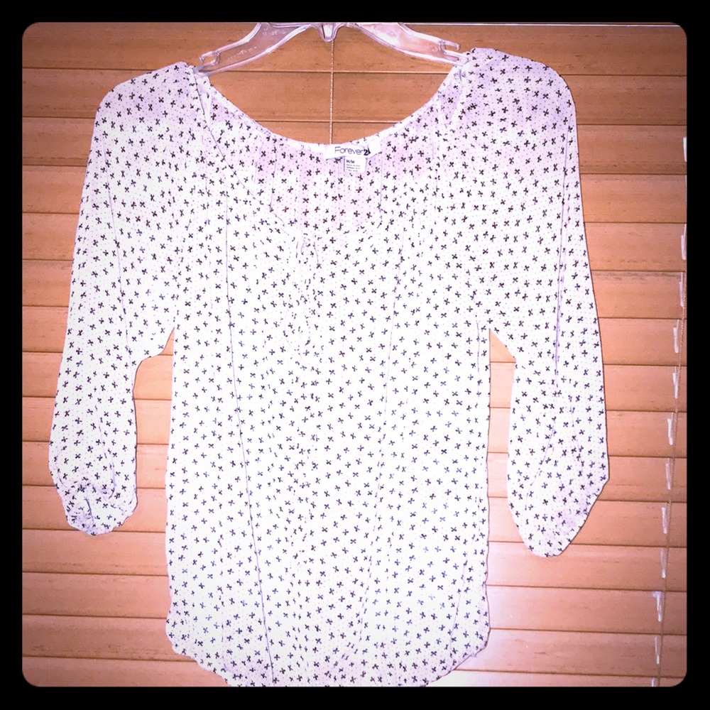 Cute top with little bows on it